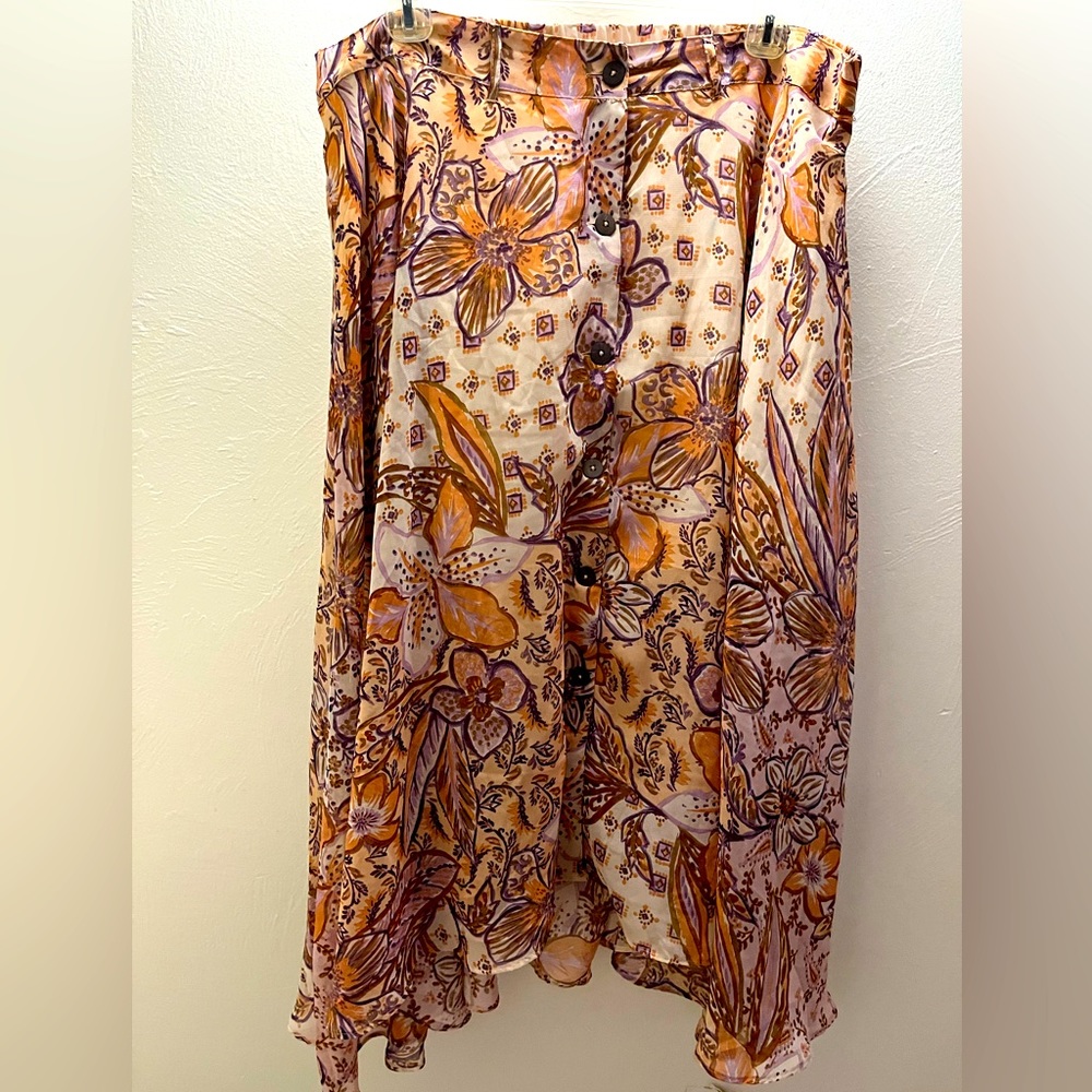Truly for You handkerchief hem skirt in oranges browns in a size 3X.